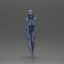 naked woman placing her hand on her legs, wearing a cap - Only-Games