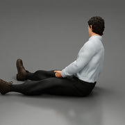 Accident of a male worker sitting on the floor with an injured - Only-Games