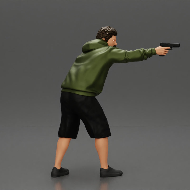 gangster man in a hoodie and shorts shooting a gun behind the car