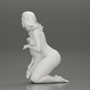 Sexy girl in bikini sitting and covering her body by towel - Only-Games