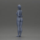 Naked woman standing hand resting on her back speaking into a radio - Only-Games