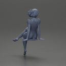 beautiful girl in dress sitting outside with her short hair blowing in the wind - Only-Games