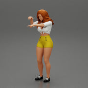 Travel woman in short pointing her next destination using world map - Only-Games