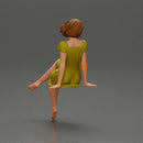 beautiful girl in dress sitting outside with her short hair blowing in the wind - Only-Games