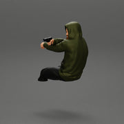 gangster in hoodie driving a car and holding gun - Only-Games