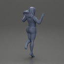 happy girl in a mini jacket and shorts, jumping on one leg - Only-Games