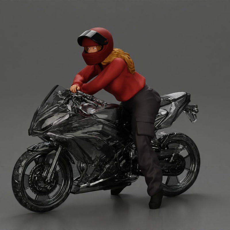 motorcyclist woman in helmet and hoodie sitting on motorcycle