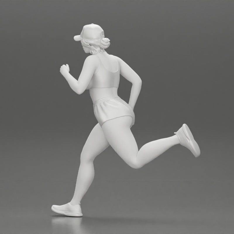 young woman running in shorts and cap