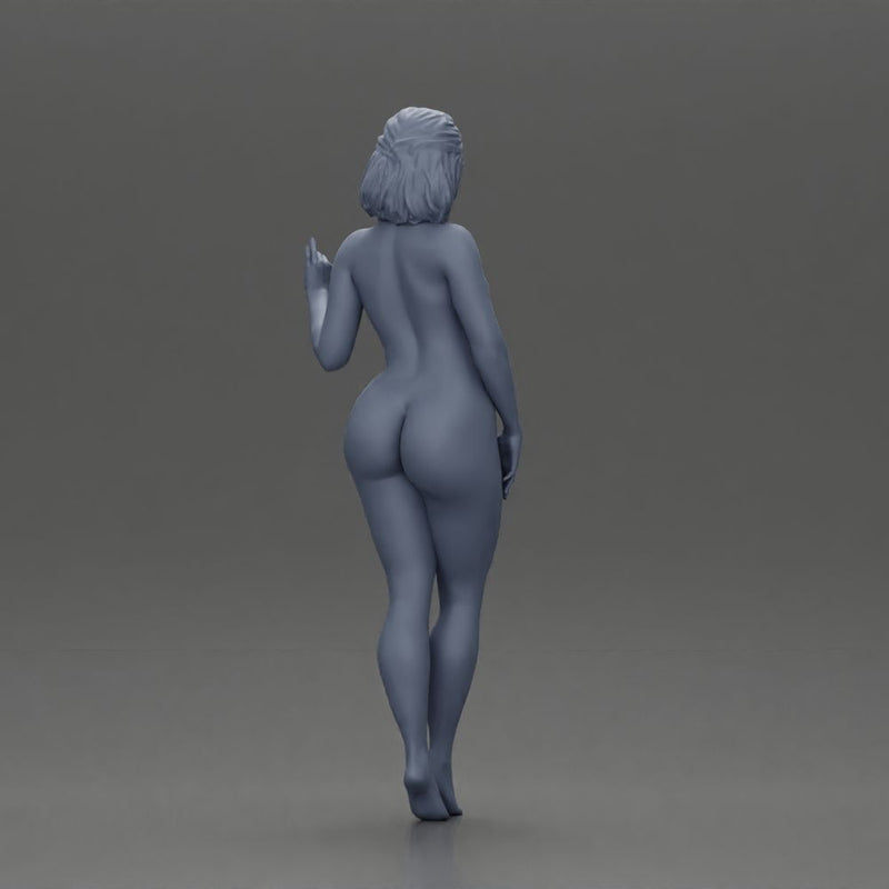 Naked girl standing and posing