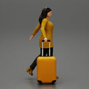 Business woman in manteau dragging suitcase  walking in airport terminal - Only-Games