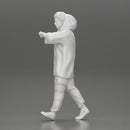 Man in a long hoodie  walking and looking at his watch - Only-Games