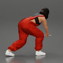 Girl mechanic in overalls turns off the front wheel of  car with a key for removing the wheel - Only-Games