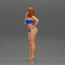 sexy girl in bikini standing smoking cigarette on the beach - Only-Games