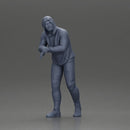 man in a hoodie leaning with his hands on the car - Only-Games