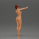 Naked woman taking a selfie with her phone on the beach - Only-Games