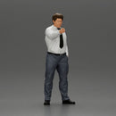 Serious businessman in a white shirt tie, and pants pointing with authority, hand in pocket - Only-Games