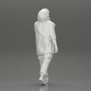 Man in a long hoodie  walking and looking at his watch - Only-Games