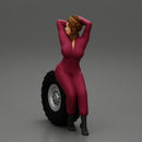 2 Models - SEXY GIRL MECHANIC IN SUIT SITTING ON A TRUCK TYRE AND HANDS IN HAIR - Only-Games