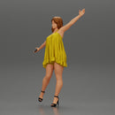 Happy Young Woman in dress and heels Standing on One Leg holding phone - Only-Games
