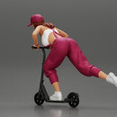 girl in overalls suit and cap riding fast an electric scooter - Only-Games