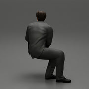 businessman sitting and holding briefcase of money - Only-Games
