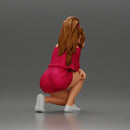 fashionable girl in beachwear is sitting and looking - Only-Games