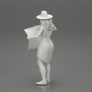 travel woman in hat and dress with sun glasses holding a map and looking to the map - Only-Games