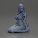 Beautiful Woman in Bikini Sitting on the Beach - Only-Games