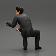 businessman sitting and holding briefcase of money - Only-Games