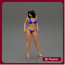 sexy girl in bikini posing standing on the beach