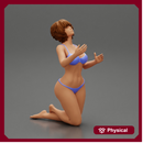Sexy girl in bikini with short hair sitting on her knees