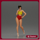 Striking a flirty pose wearing yellow crop top red bottoms