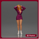Confident woman in purple dress and white heels striking pose
