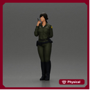 policewoman standing hand resting on her back speaking into a radio with short hair