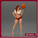 Sexy Young Sporty Girl Playing With the Ball on the Basketball