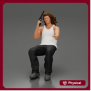 Man sitting with gun in hand pointing forward calmly