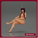 Naked girl sitting with crossed legs with long pigtails