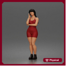 Thoughtful woman stands hand on cheek wearing vest shorts boots