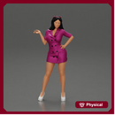 Stylish woman with sunglasses in her hair, exuding chic elegance while striking a pose in a fashionable dress