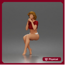Sitting Woman Clasping Hands Near Chin In Crop Top Bottoms