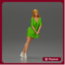 Stylish Woman in Green Dress and White Heels with Pose