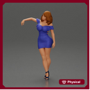 Elegant pose in vibrant blue dress with matching high heels