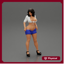 Sexy woman showing her breasts undressing her shorts