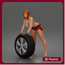 woman Pushing Tire In Bikini Top Shorts Tool Belt And Gloves