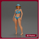Stylish woman modeling modern asymmetric bikini and hat