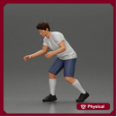 Man in shorts playing table football