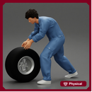 Mechanic worker walking and rolling tyre