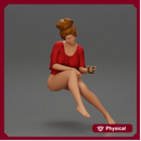Relaxed girl in red sipping coffee enjoying a peaceful moment on the beach
