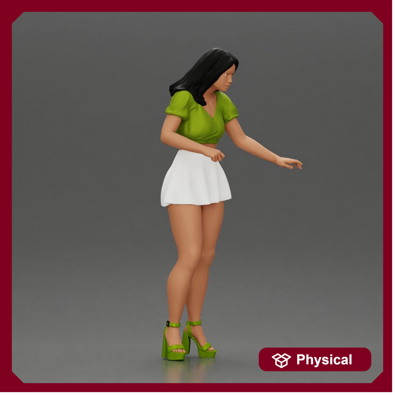 woman standing with a green top white skirt looking like they want to hold something