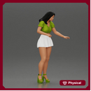 woman standing with a green top white skirt looking like they want to hold something